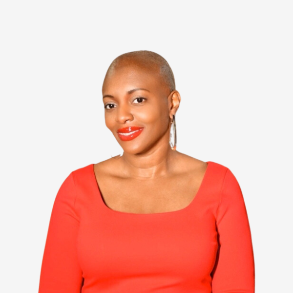 Picture of Founder Nikki on a laptop screen. She is wearing a red top, with red lipstick, smiling.